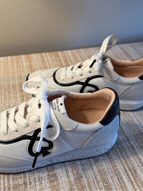 kate spade white sneakers with black trim
